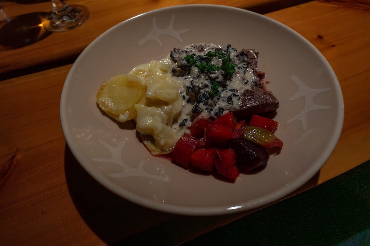 Livo Arctic Resort
_____
A plate with reindeer, a mushroom sauce, vegetables, and potatoes