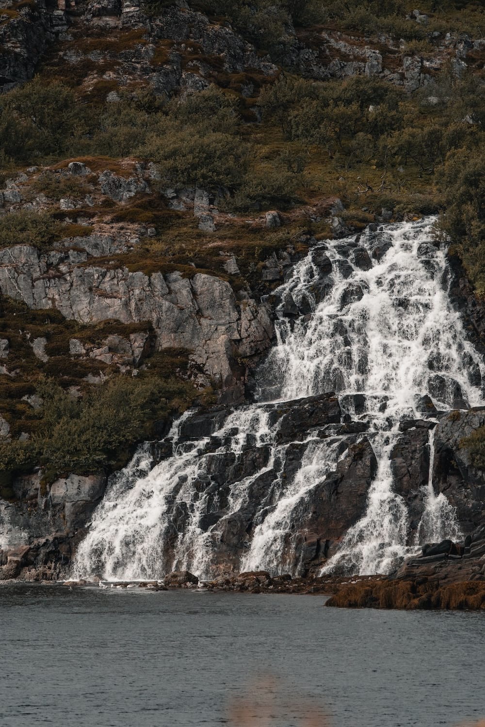 Waterfall into the sea in Skjånes