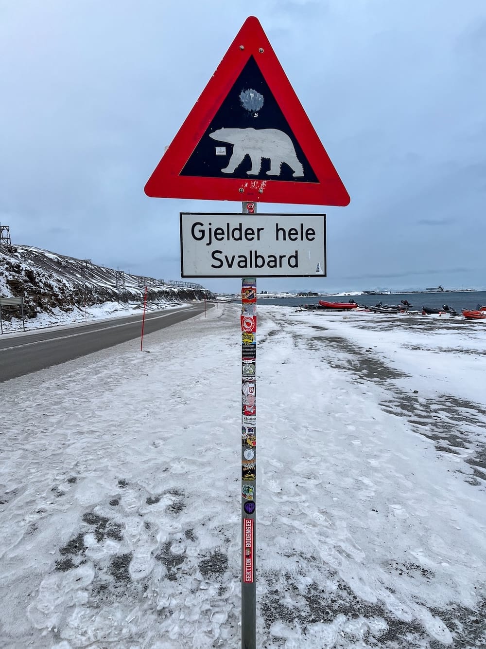 Visiting Svalbad Sauna in Svalbard
____
a sign with a polar bear on it