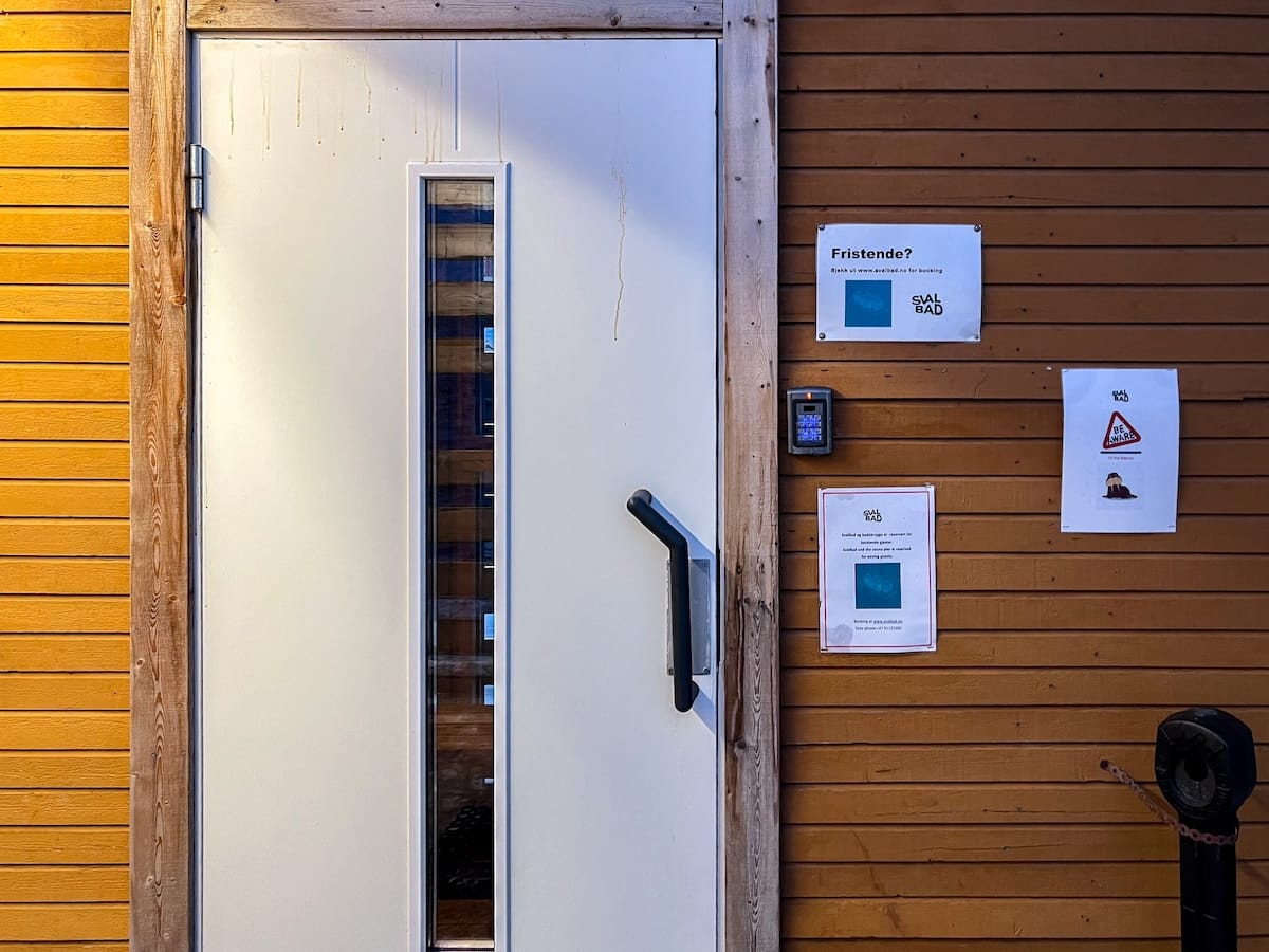 Visiting Svalbad Sauna in Svalbard
____
a door with an entrance keypad to the right of it