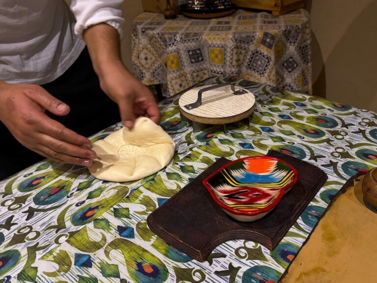 a man making bread on a table