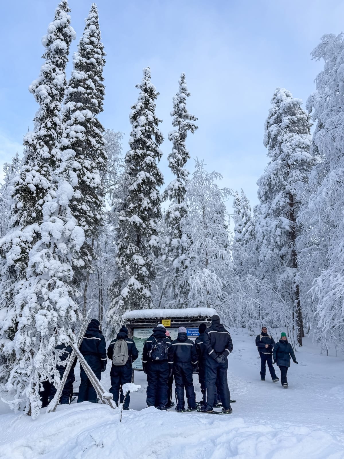 a group of people starting a tour in a snowy location