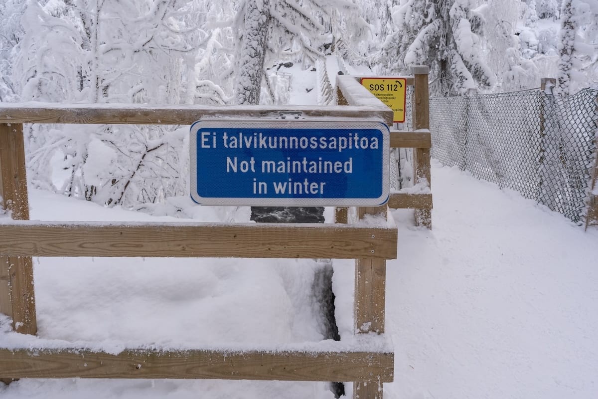 a sign saying the trail is not maintained
