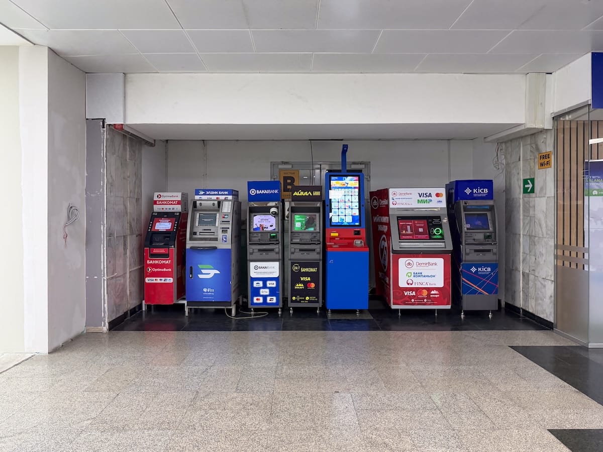 a line of ATMs in an airport