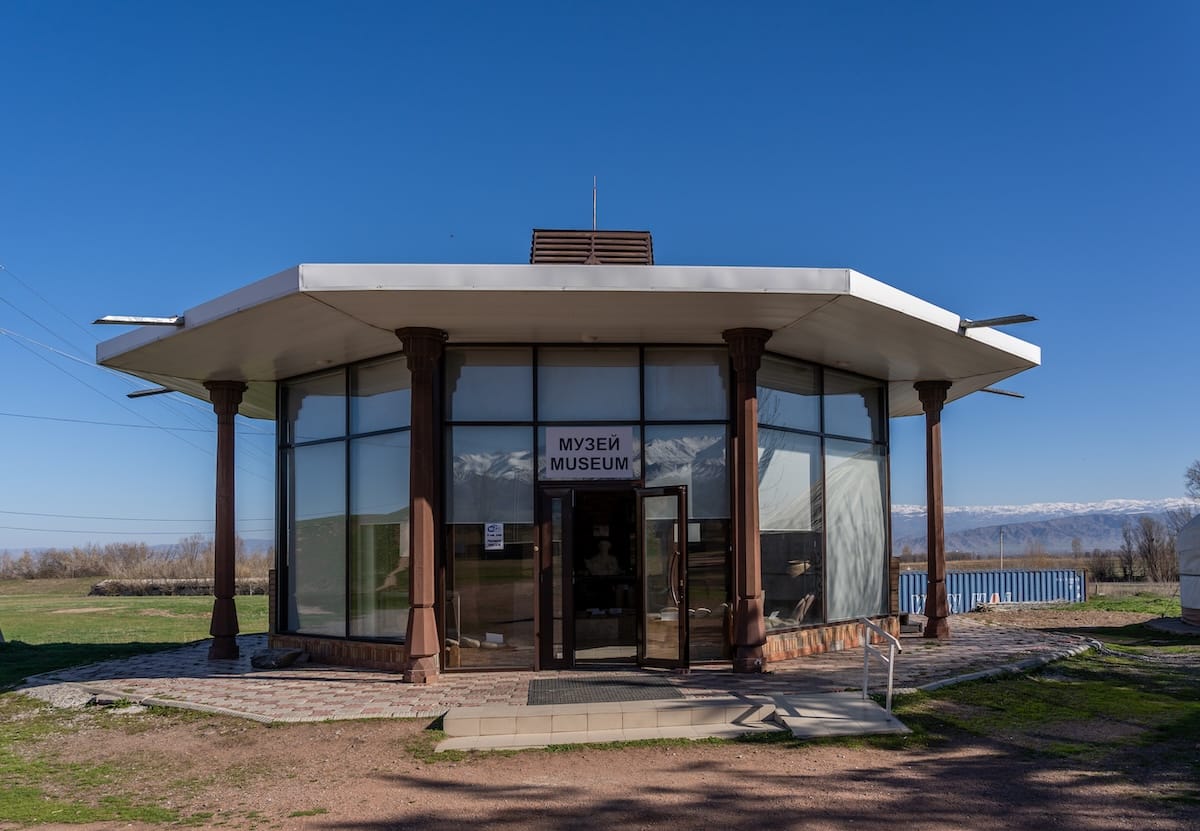 a photo of a small circular museum outside