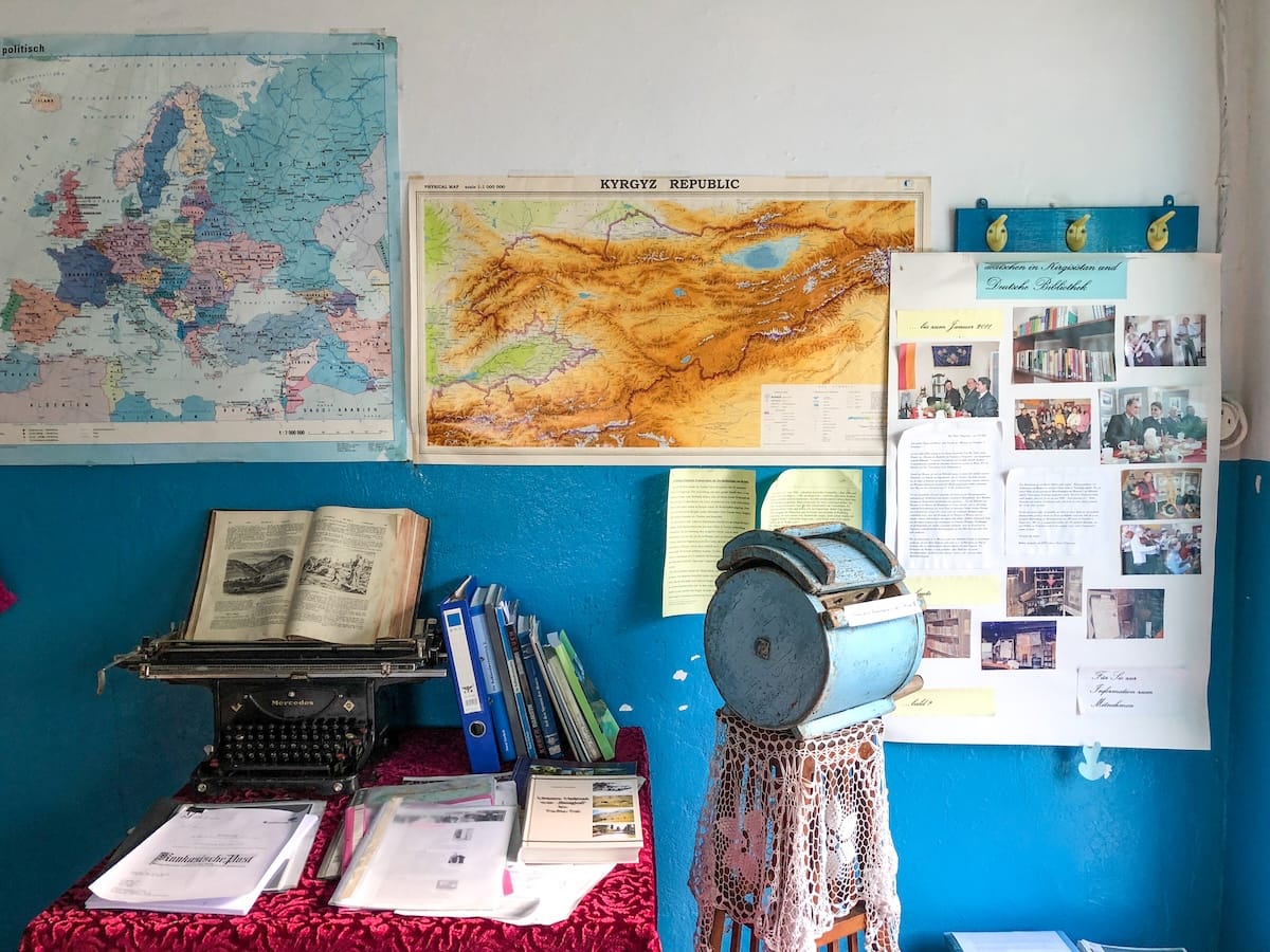 a museum with historical facts and a white and blue wall