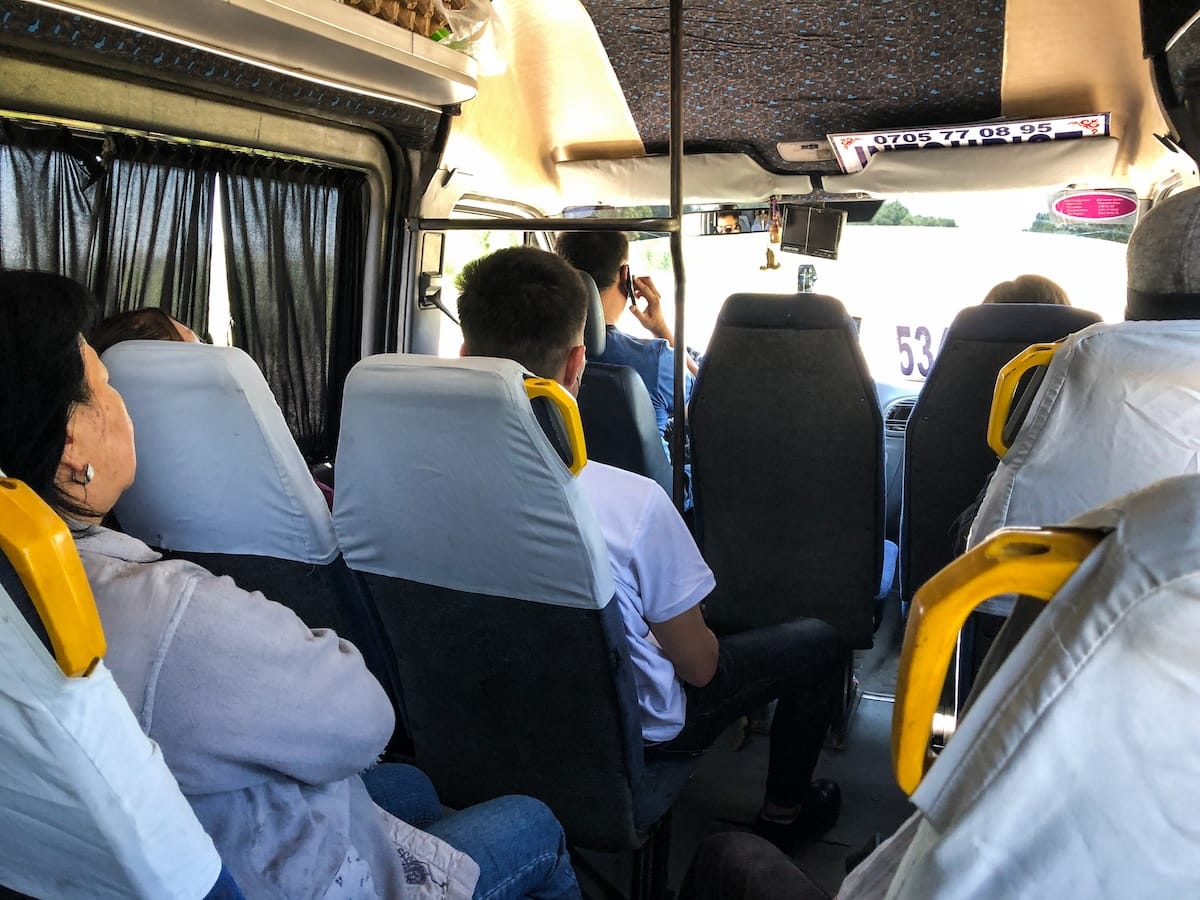 people inside a minibus in central asia
