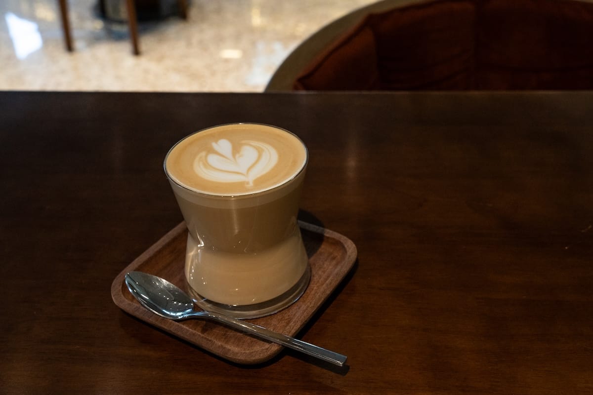 a flat white coffee on a table