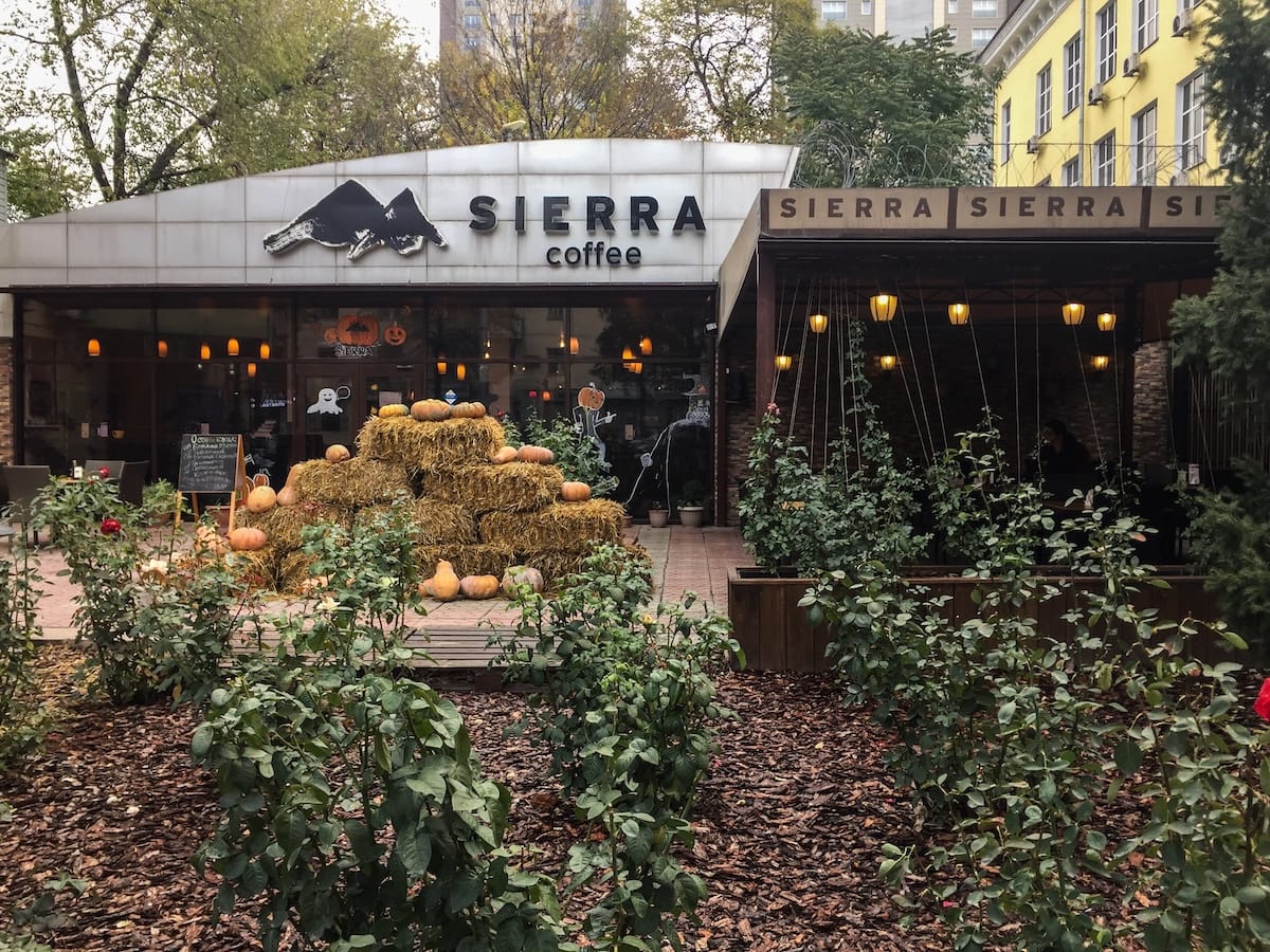 a photo of the outside of a cafe in late fall