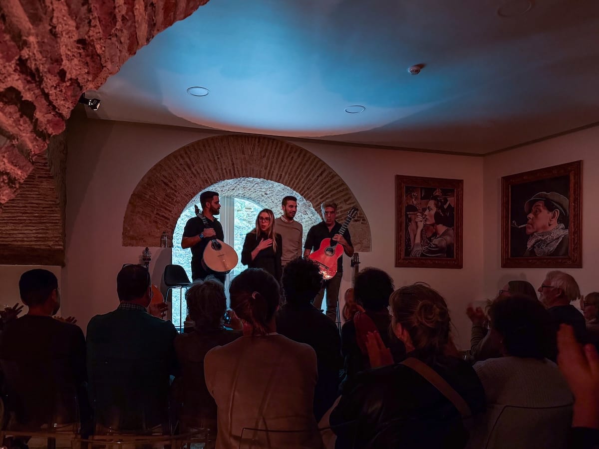fado singers on a stage in lisbon