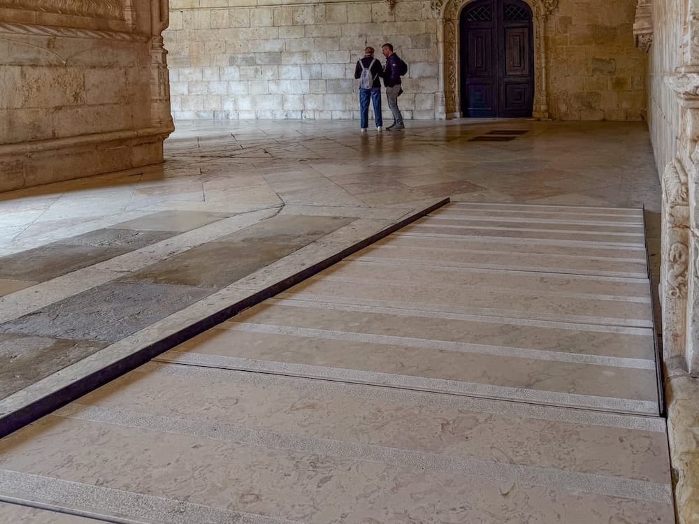 a small ramp on a marble floor in a monastery