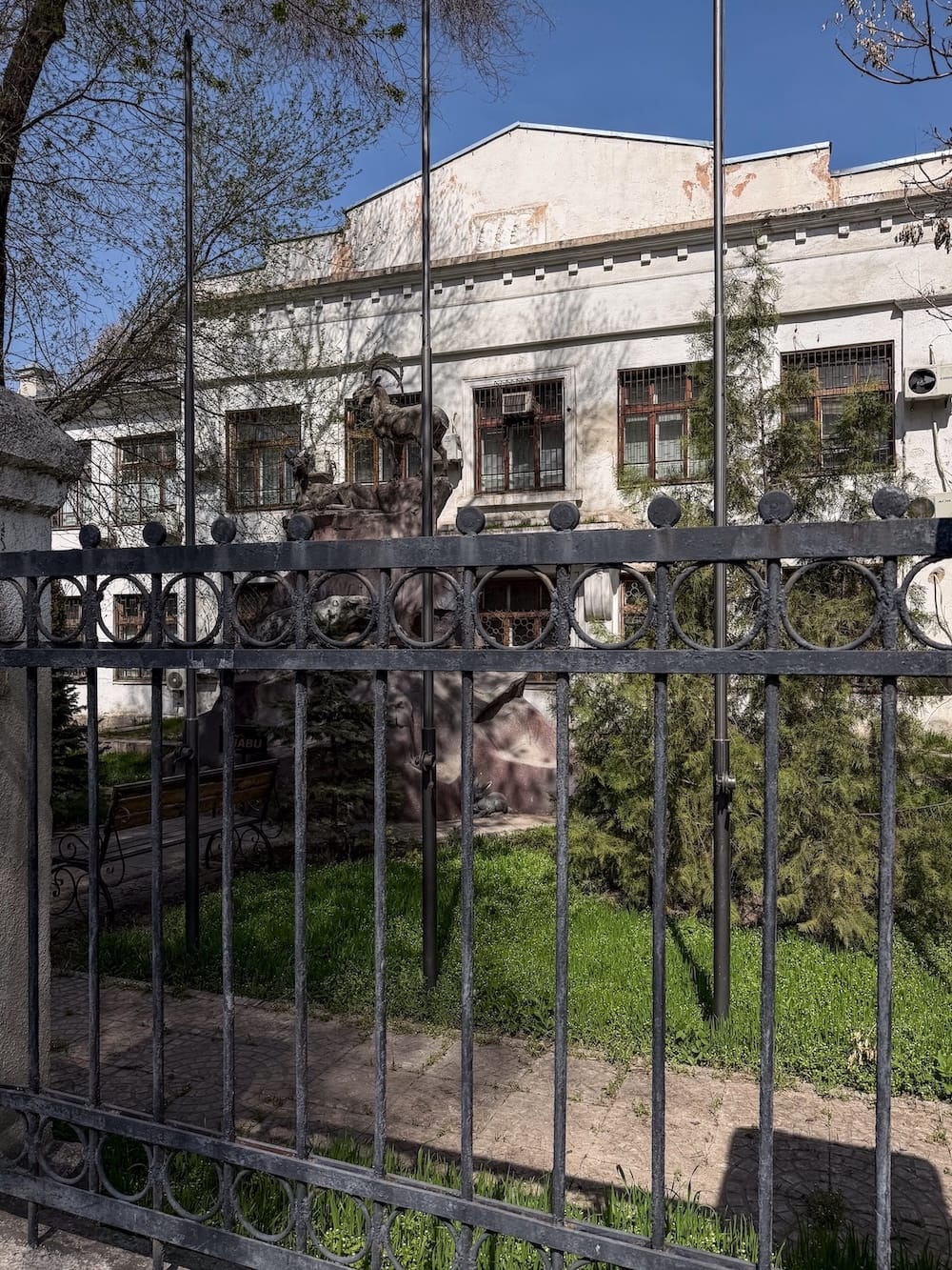 a building with a gate in front of it