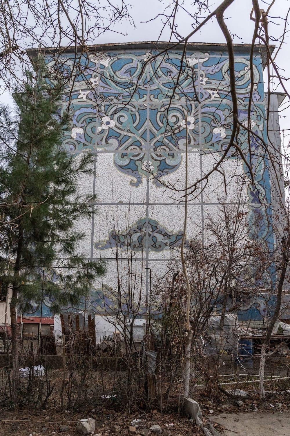 a mosaic on the side of a building