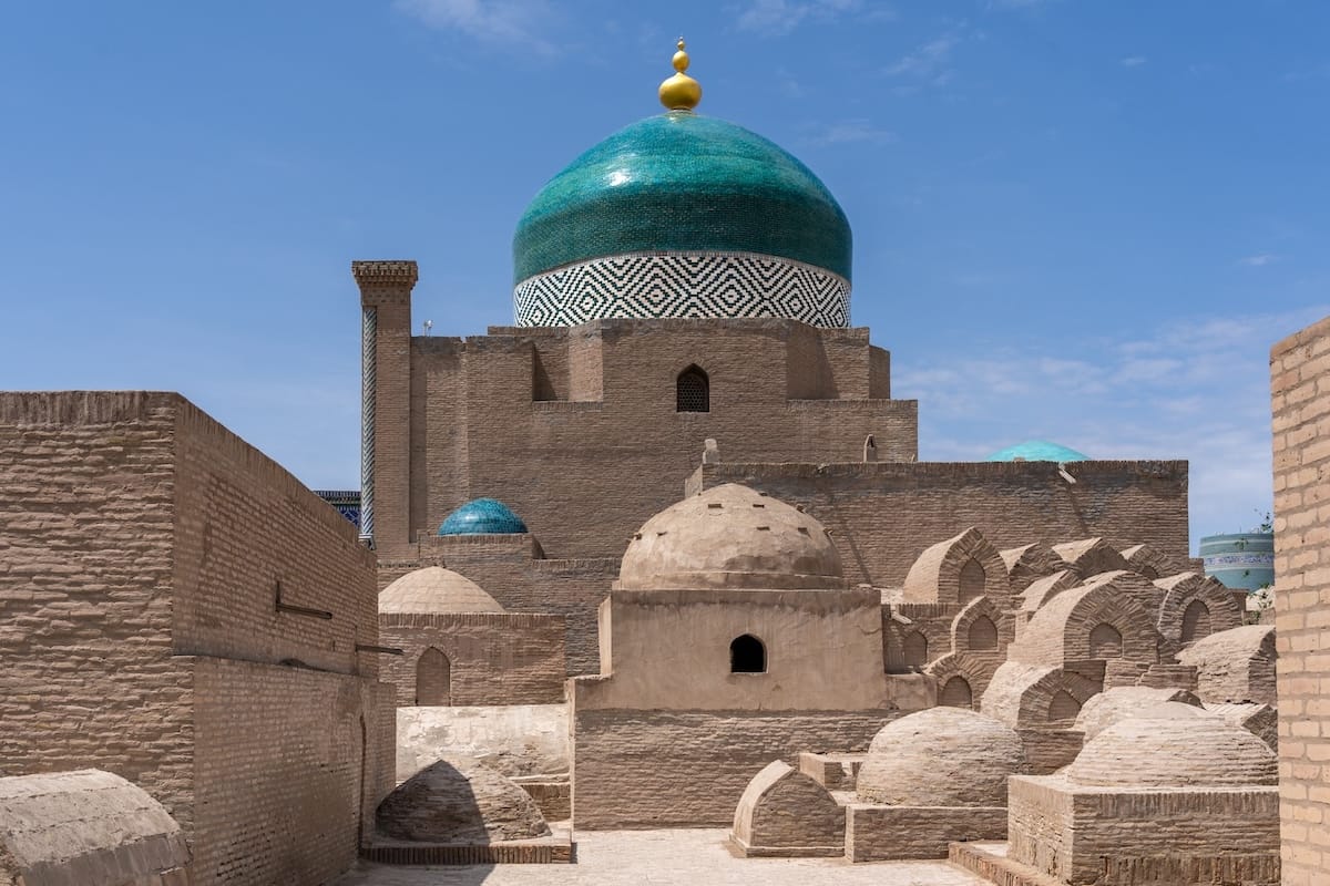 an old structure with a gorgeous teal dome