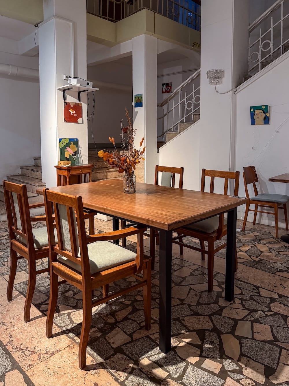 a Soviet-era apartment basement transformed into a cafe - a table and chairs