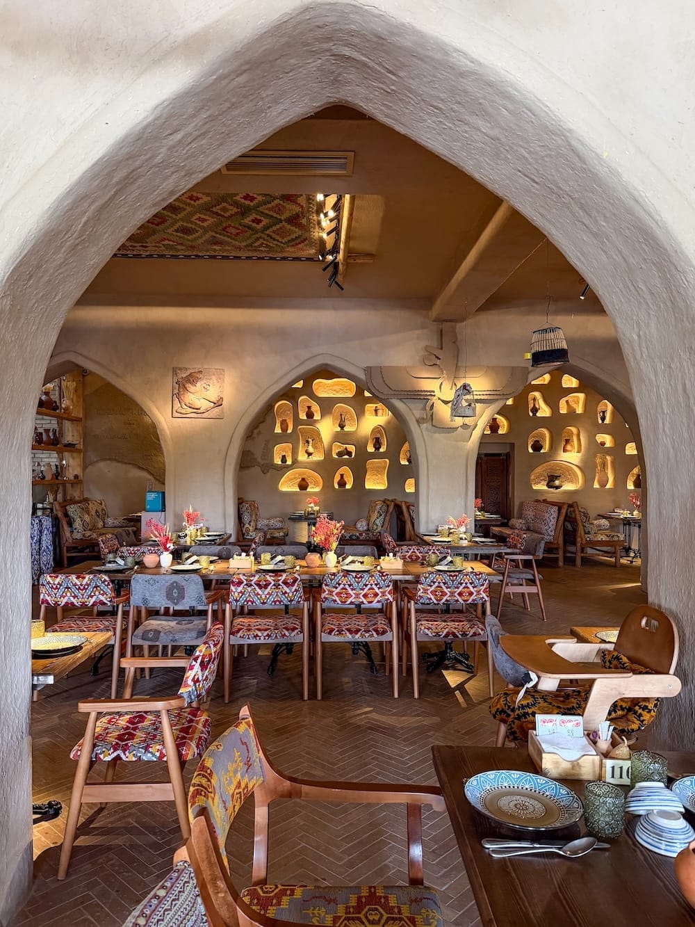 a beautiful, traditional uzbek restaurant with a lot of colorful decor