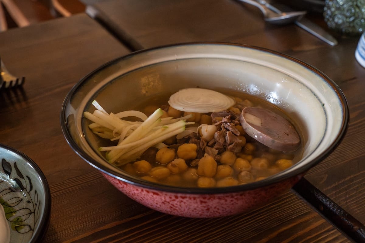chickpeas, sausage, and more in a bowl in uzbekistan