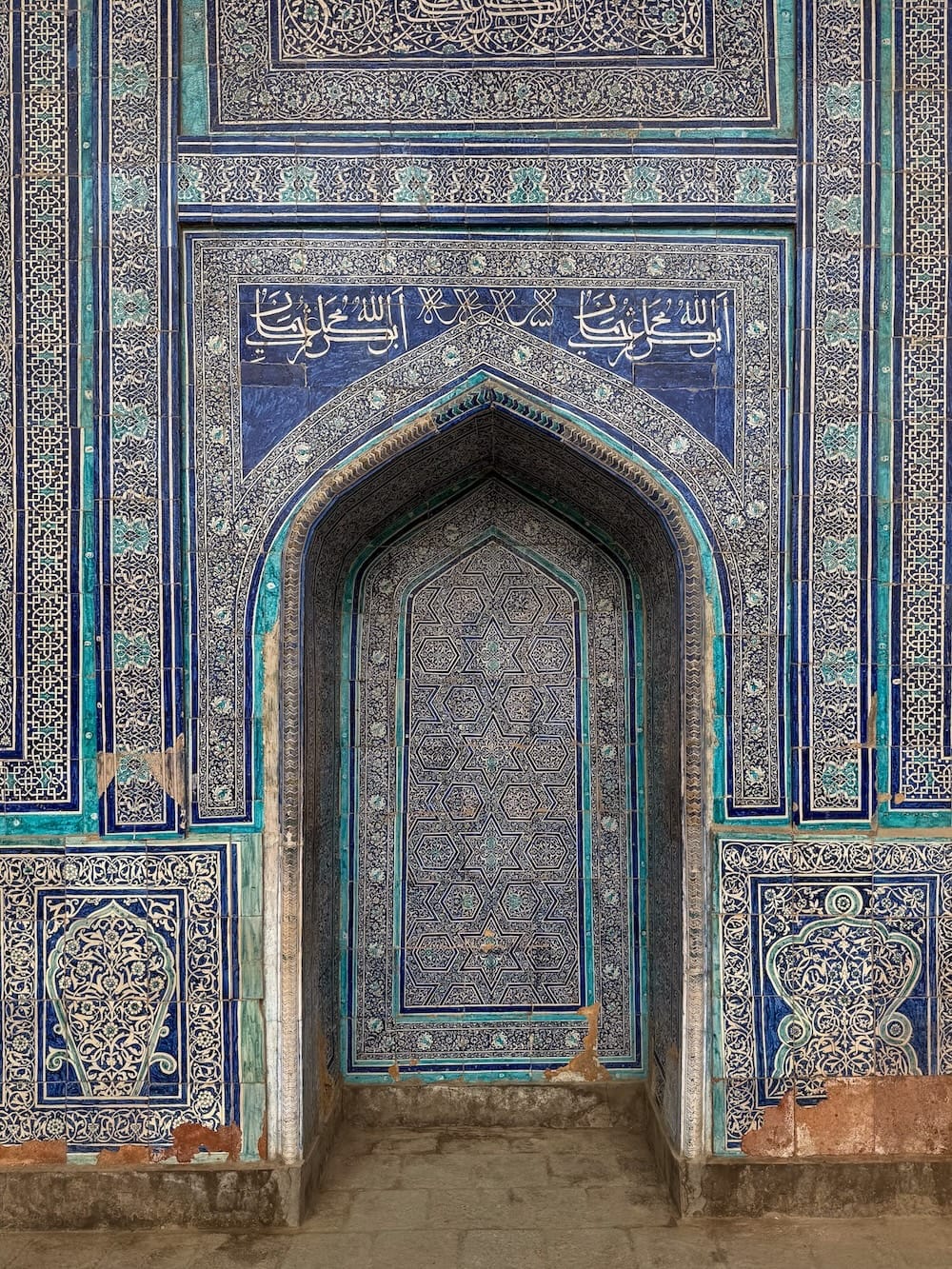 Islamic mosaics on a building in Khiva Uzbekistan