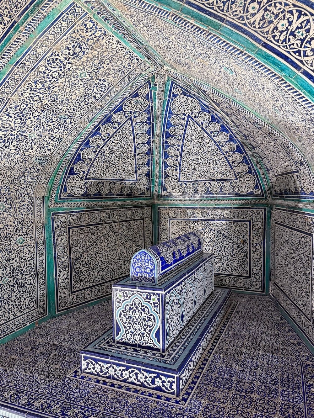 a gorgeous mosaic tiled wall in a mausoleum in khiva