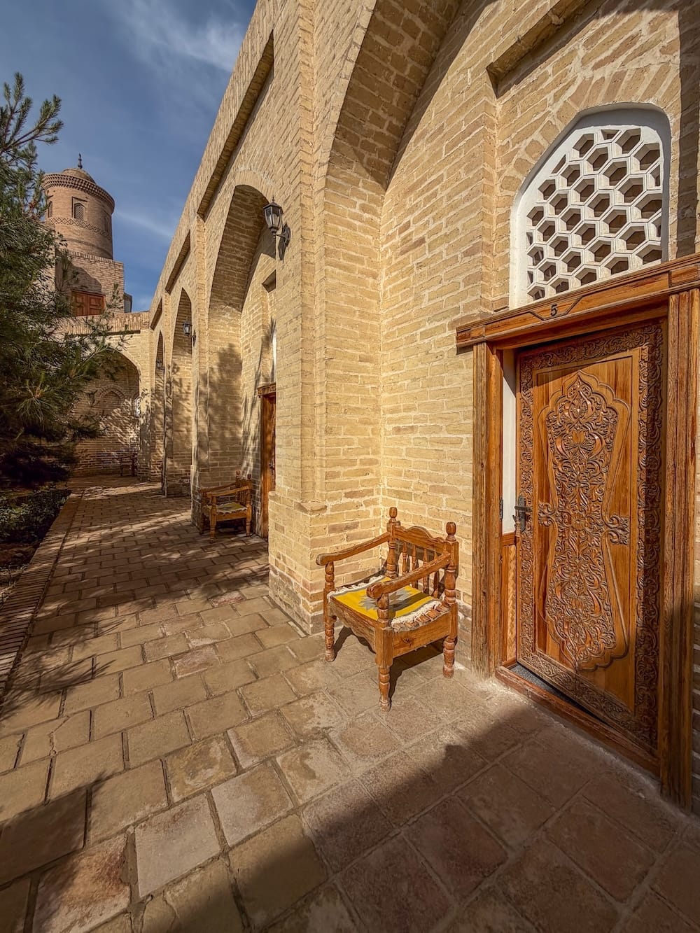 The outside of a madrasah turned hotel in Khiva Uzbekistan