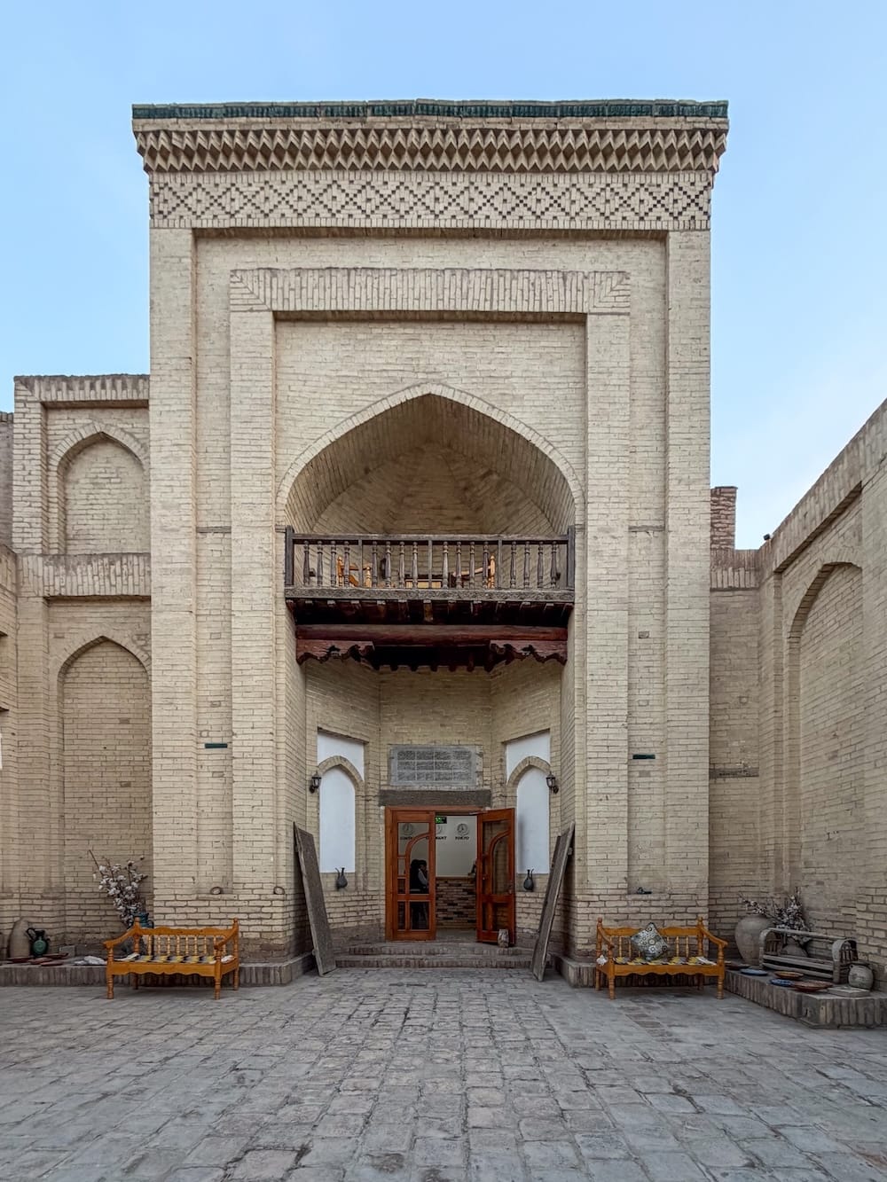 a madrasah that has turned into a hotel in uzbekistan