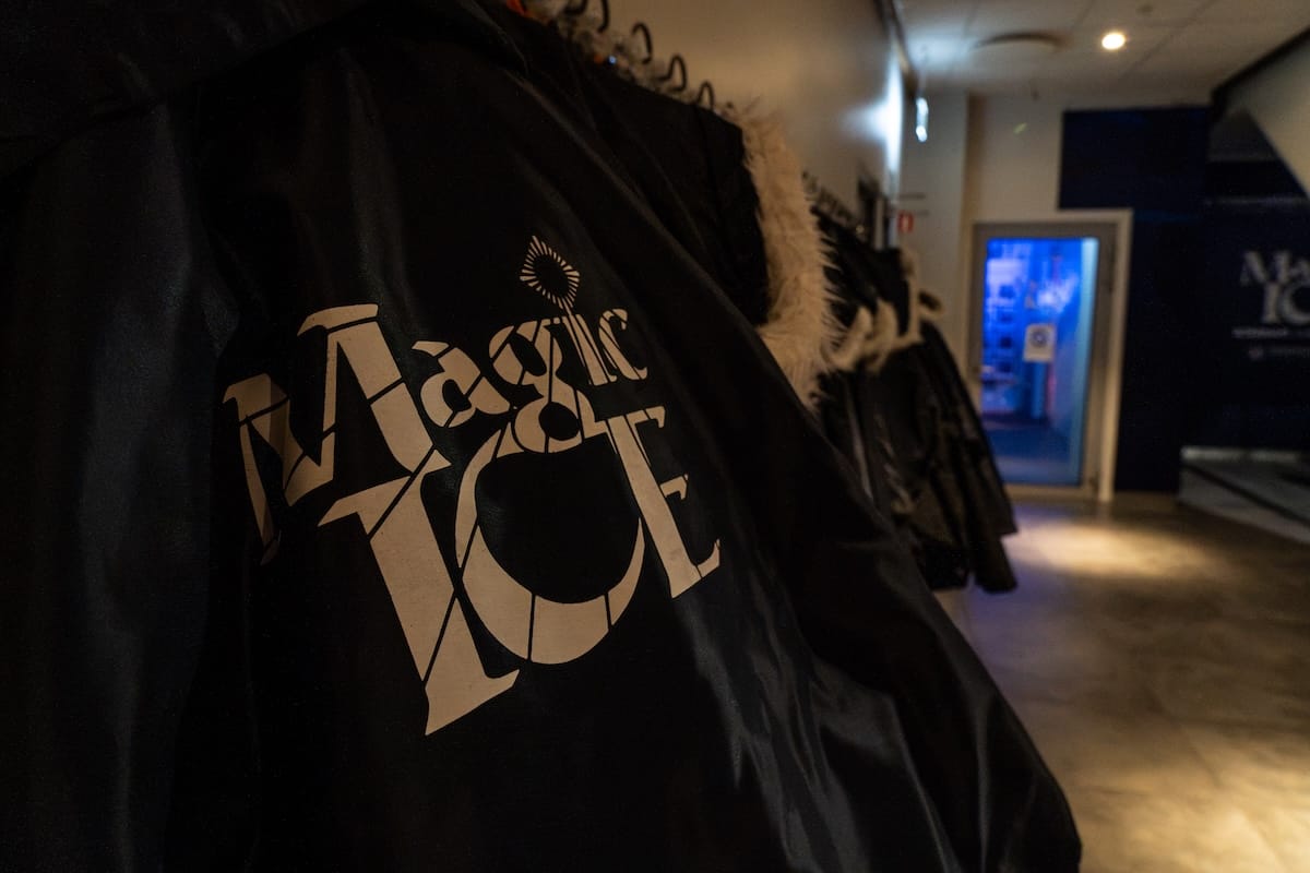 a branded parka with words 'magic ice' written on it