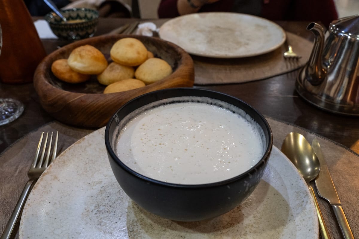 a bowl of white soup at a restaurant in kazakhstan