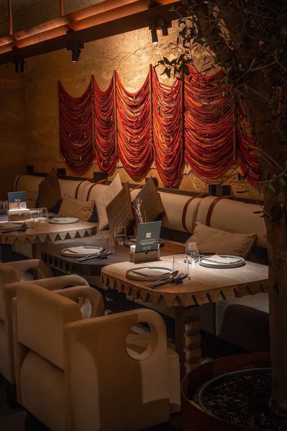 Azerbaijani-Kazakh food in Almaty (Alcha)

a photo of a dark restaurant with beautiful decor on the wall