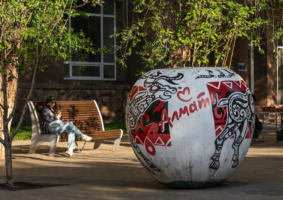a public art in the shape of an apple in almaty
