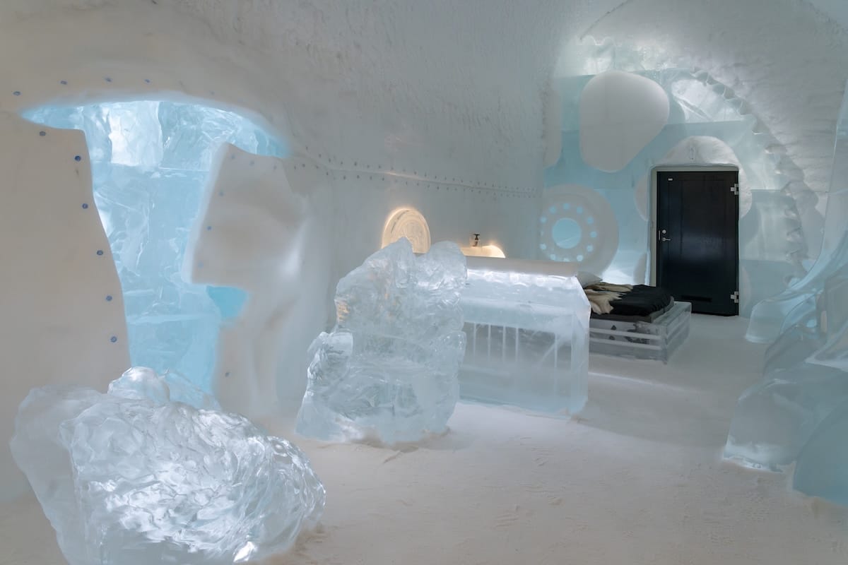 a room made of ice at an ice hotel in sweden