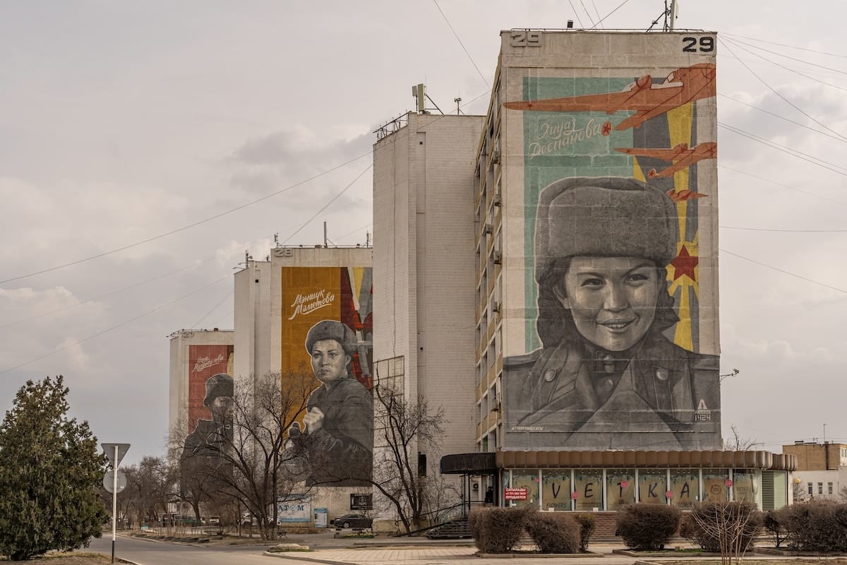 murals on three buildings in kazakhstan of women that were heroes in wwii