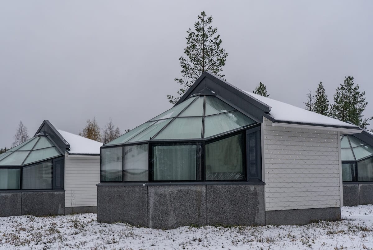 The outside of Santa's Igloos Arctic Circle
glass igloos under a cloudy sky in winter