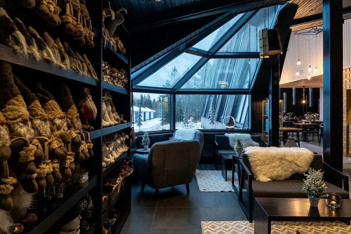 Lobby at Santa's Igloos Arctic Circle
a glass roof lobby at a cozy hotel in lapland