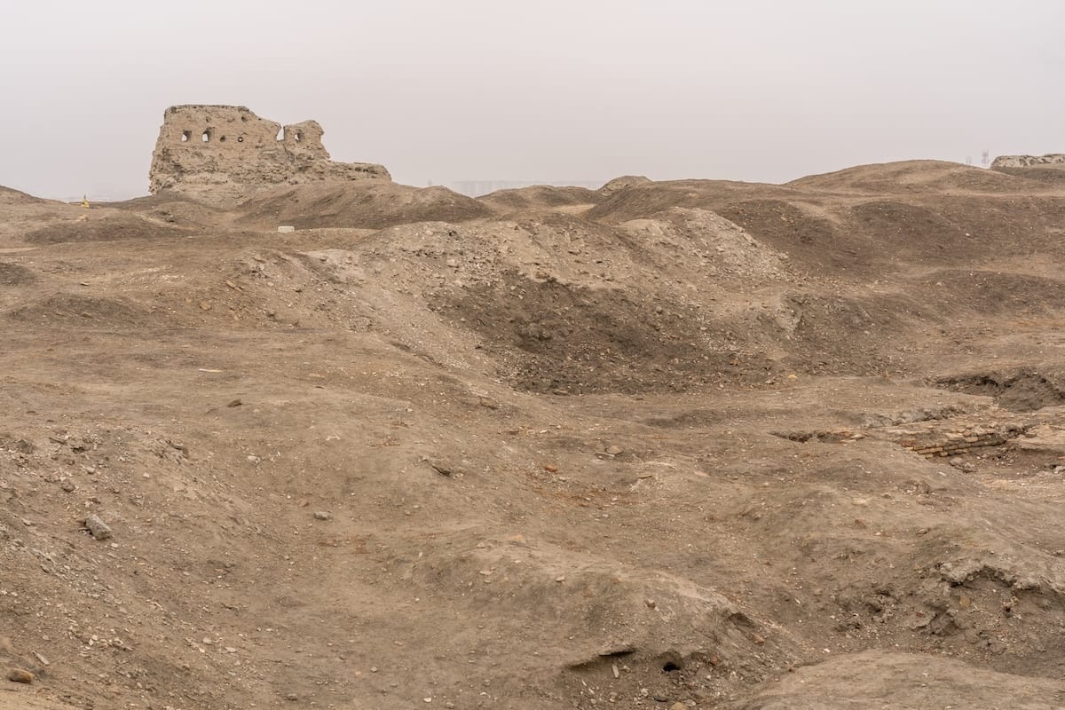 Crumbling ruins and earthen mounds inside the Ark of Bukhara fortress in Uzbekistan